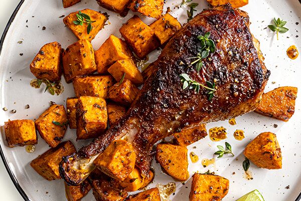 Jerk Marinated Turkey Legs with Mango Glazed Sweet Potatoes